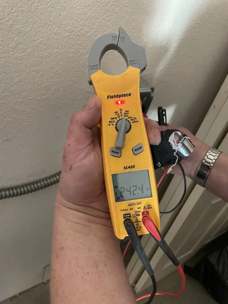 Voltage testing with clamp meter during Circuit Breaker Repair in Moorhead